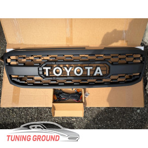 Решетка радиатора стиль Off road на Land Cruiser 100 1998-2002 год